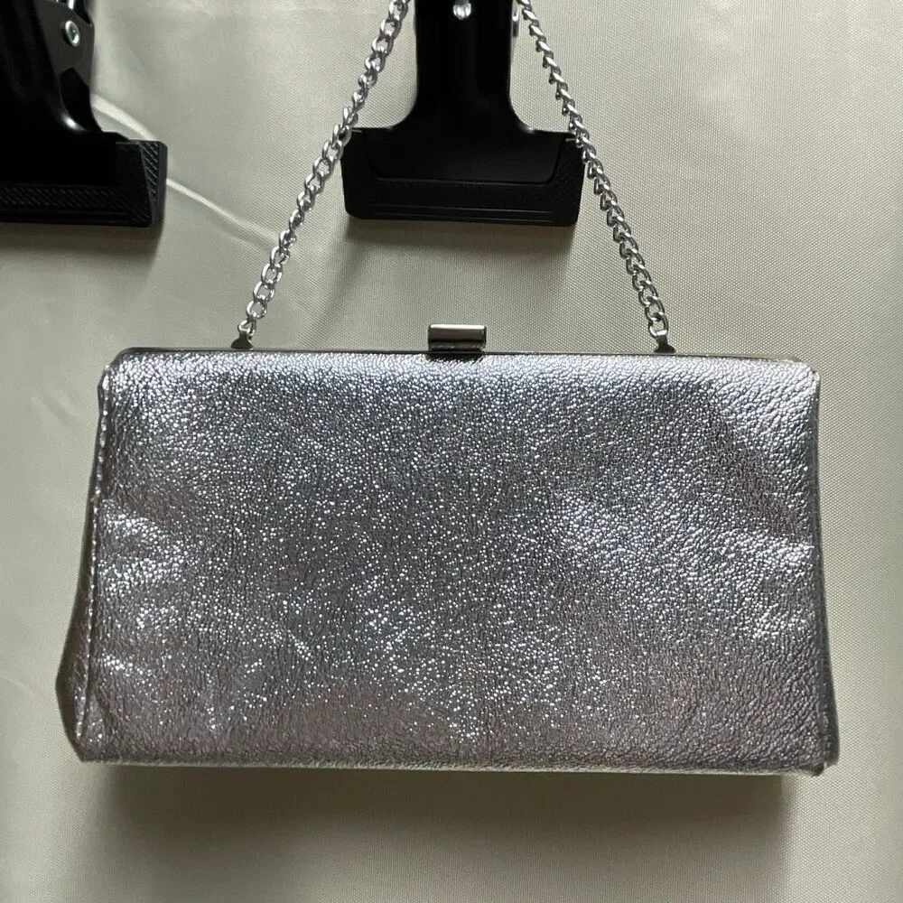 Vintage silver clutch with chain handle. Silver metallic